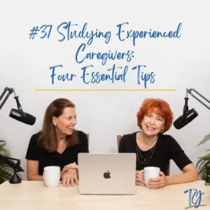 Two women sharing caregiving tips over coffee and a laptop.