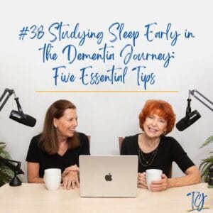Two women sitting with coffee, discussing dementia care tips.