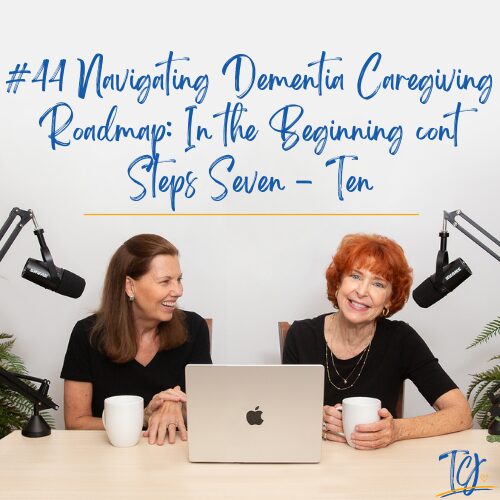Two women smiling and chatting over coffee with a laptop.